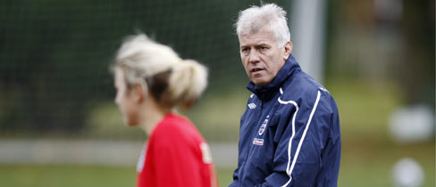 Head Coach Brent Hills looks on at a Women's U23 training session.